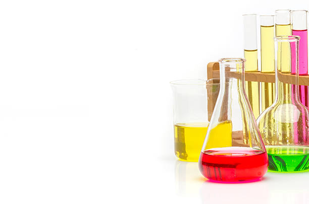 istock Test tubes with liquids isolated on white 540513076