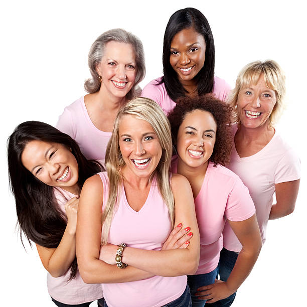 istock Smiling group of women in pink 540513472