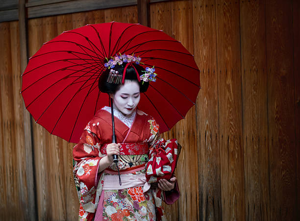 istock Beautiful Geisha walking through Kyoto 540514234