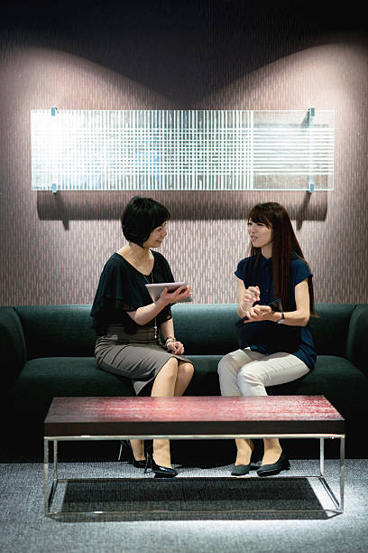 istock Asian business women talking at the office 540515540
