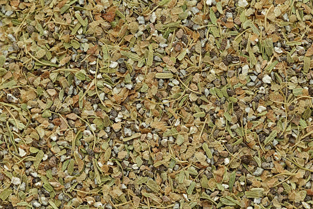 istock Organic dry green cardamom (Elettaria cardamomum) tea cut seeds. 540516142