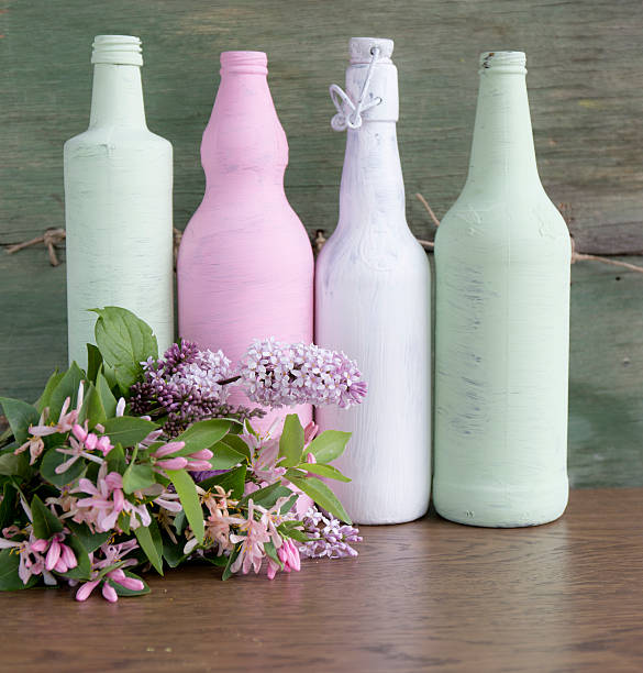 Handmade paint art with watercolors on bottle