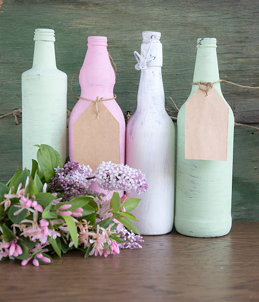 Handmade paint art with watercolors on bottle