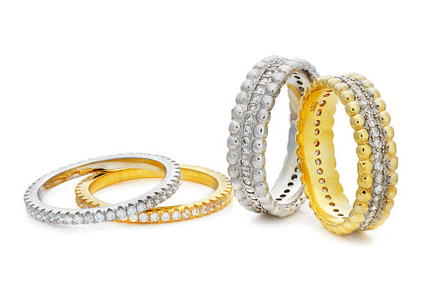 istock Four rings made of  gold and a silver with diamonds 540521316