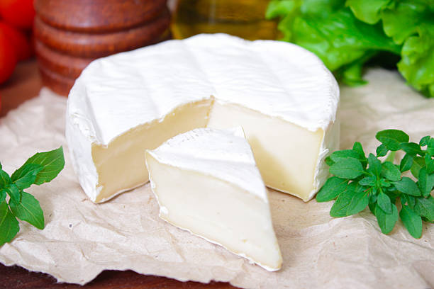 istock Brie cheese. Camembert cheese. Fresh Brie Camembert cheese 540521488