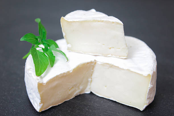 istock Brie cheese. Camembert cheese. Fresh Brie Camembert cheese 540521586