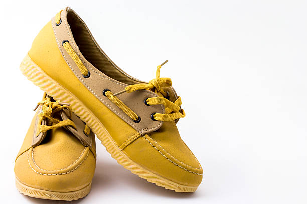 istock Yellow shoes white background 540522450