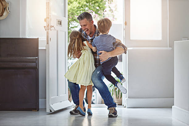 istock They hang all over him when he gets home 540522654