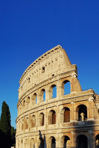 Colosseum in Rome against blue sky, Italy