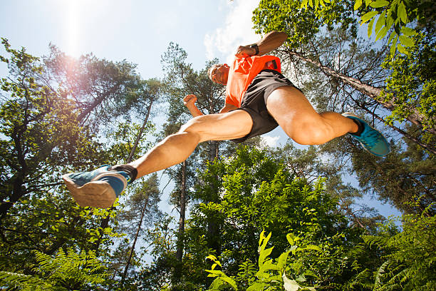 istock Cross-country runner in the air 540524428