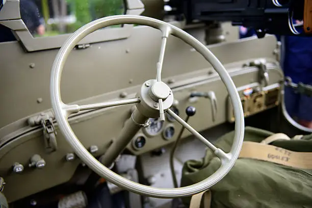 close up of a steering wheel military vehicle