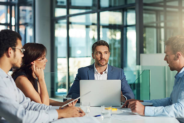 istock Putting their heads together 540526262
