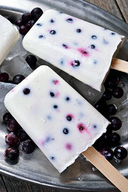istock Homemade popsicles from yogurt, blueberry and blackcurrant, clos 540527408