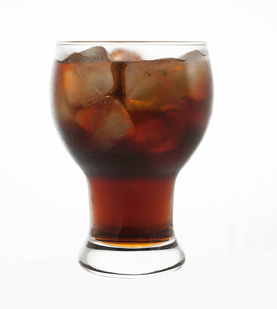 istock cola in glass with ice isolated 540532254