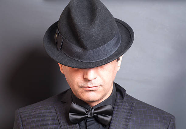 istock Man in black hat and black bowtie 540534646