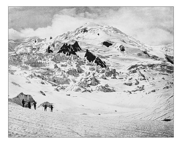Antique photograph of summit of the Mont Blanc (Europe)-19th century Antique photograph of summit of the Mont Blanc with a group of mountaineers on the left of the picture, taken at the end of the 19th century. The Mont Blanc or Monte Bianco, at the border between Italy and France is the highest mountain in the Alps (Europe) and the top is covered in perennial ice and snow.  mont blanc photos stock pictures, royalty-free photos & images