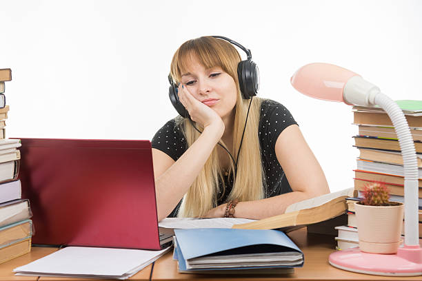 istock Student thinking and looking with interest at a laptop 540566052