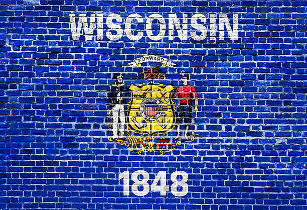 istock Wisconsin US flag painted on old vintage brick wall 540566198
