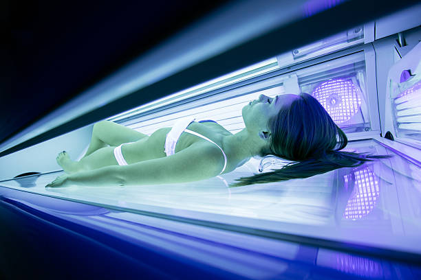 istock Beautiful woman lying in solarium 540567916