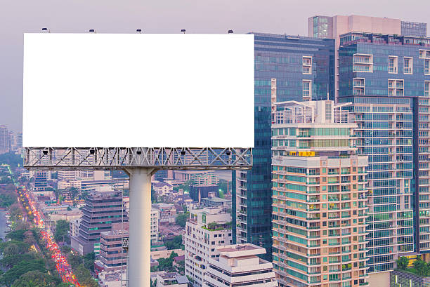 istock Blank billboard for advertisement in city downtown at night 540568224