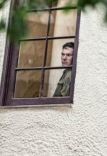 istock Military World War Two US Army Corporal Soldier Through Window 540568590