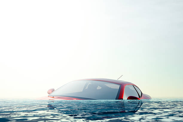 The Flood - Car floating in flood water