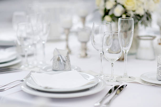 Table set for an event party or wedding reception Table set for an event party or wedding reception, winter theme wedding feast stock pictures, royalty-free photos & images