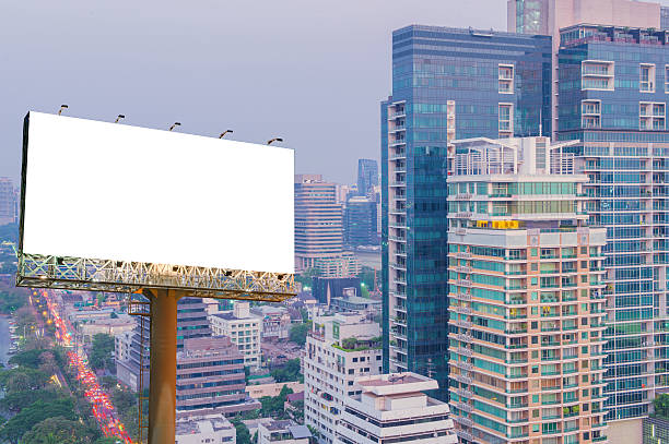 istock Blank billboard for advertisement in city downtown at night 540571496
