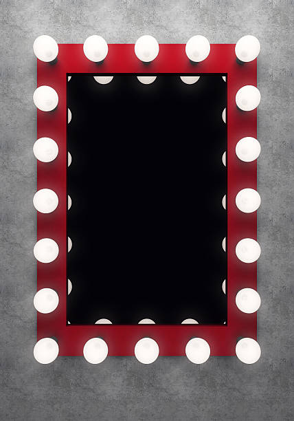 istock Red makeup mirror on the concrete wall 540572250