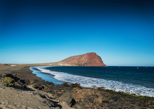 playa de las Tejitas y Montana Roja en el sur de Tenerife España photo