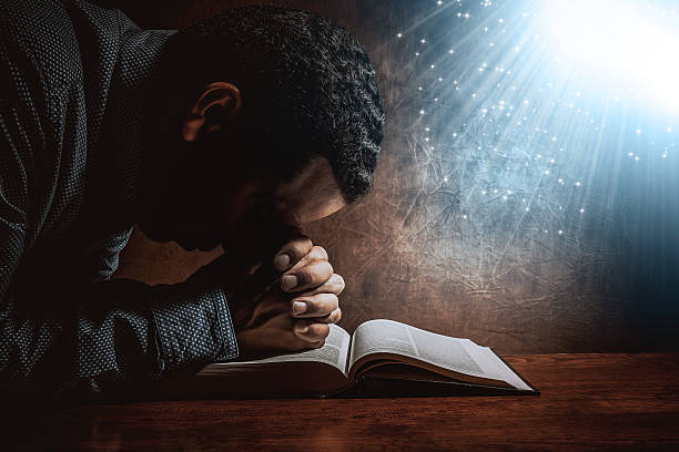 Men praying to God