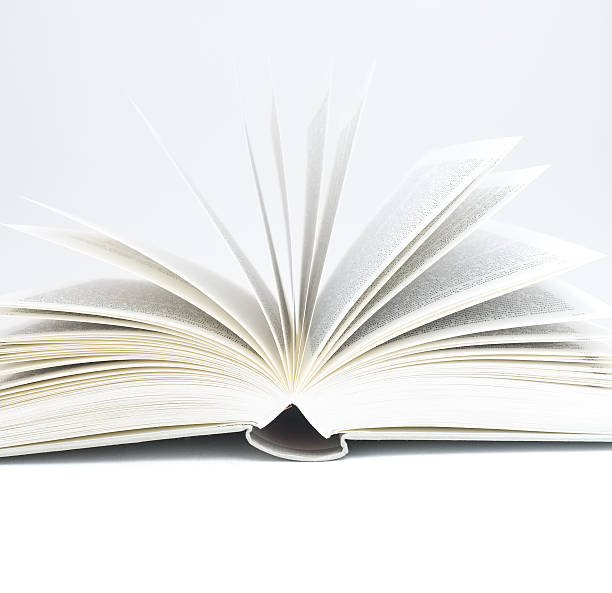 istock white book opened up against pure white background 540576472