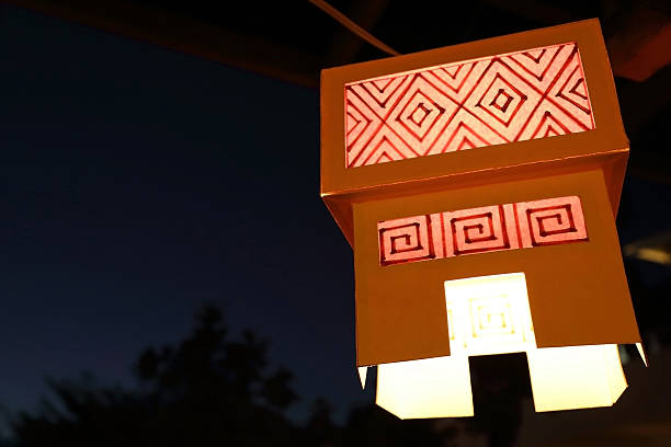 istock Hanging red paper lantern with dark background. 540577580