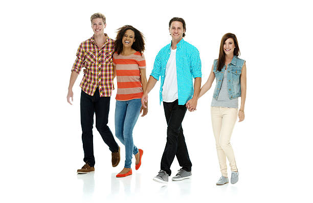 istock Four friends walking together 540579346