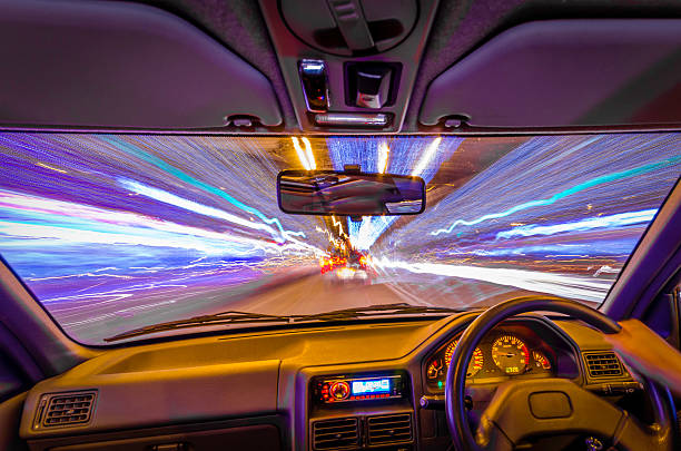 istock street lights from inside car long exposure photography colourful image 540579420