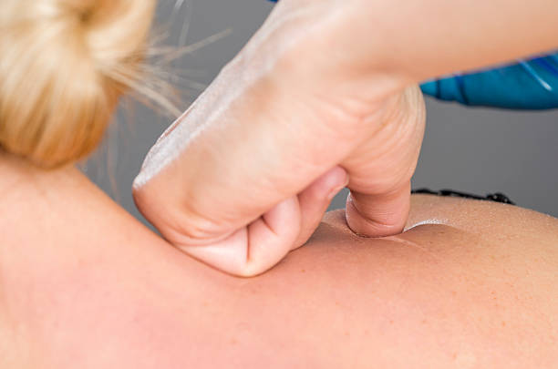 istock Doctor, physiotherapist examining her patient back. 540580208