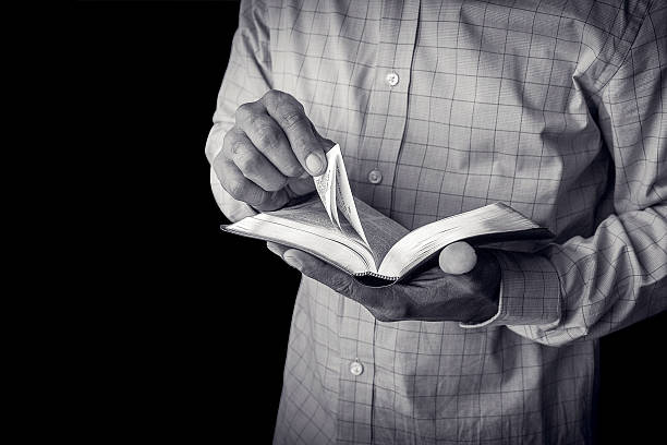 istock Man reading the Holy Bible 540581510