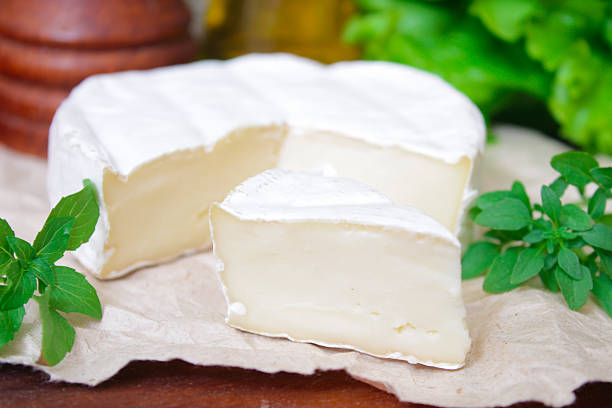 istock Brie cheese. Camembert cheese. Fresh Brie Camembert cheese 540582486
