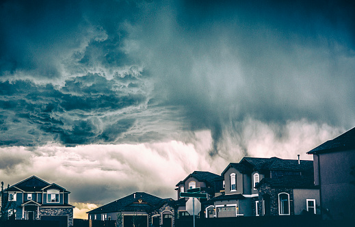 Dramatic storm clouds over residential neighborhood. Colorado, USA