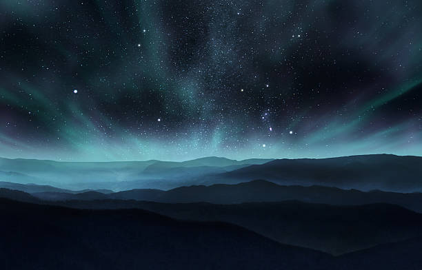 Northern lights Starry night sky with aurora over the hills aurora polaris stock pictures, royalty-free photos & images