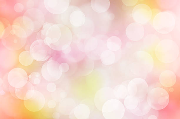 istock Abstract bokeh background: pink, yellow and white. 540588464