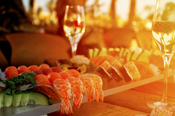 istock Close up sushi plate with champagne glasses 540590686