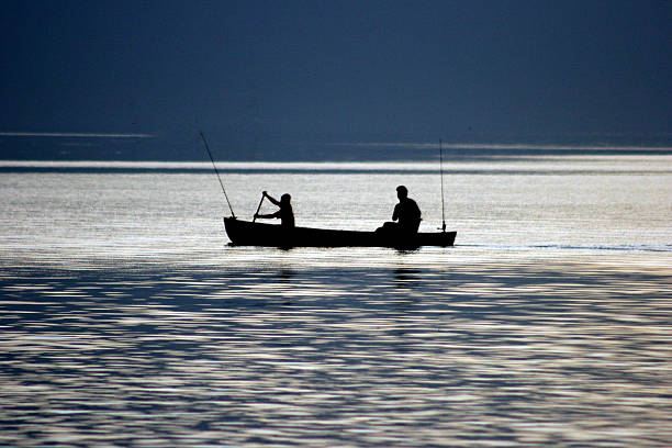 istock Father and son fishing 540591292