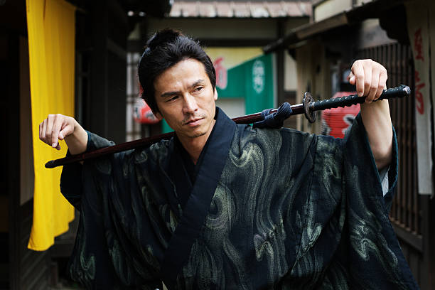 istock Samurai Posing In Traditional Japanese Village 540594530