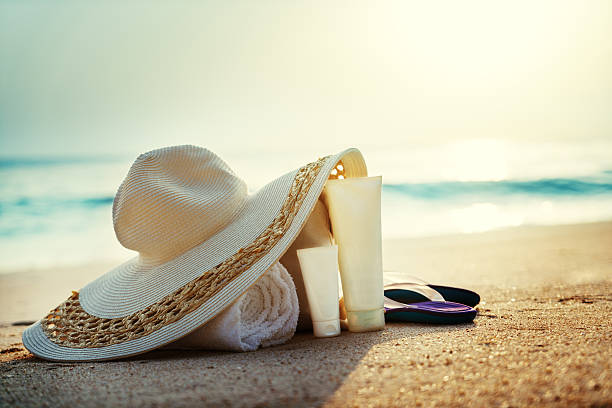 istock Sun lotion, hat  with bag at the tropical beach 540595630