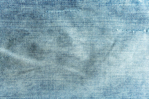 istock Texture of blue denim jeans for background use 540596230
