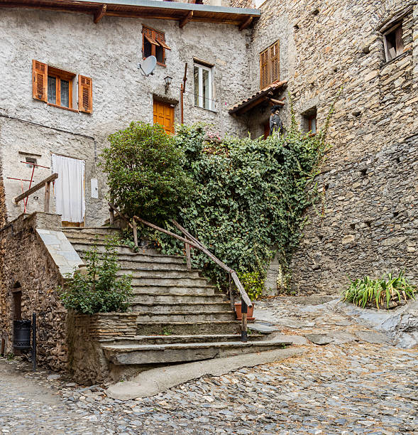 Triora, Italy - September 12, 2015: Street view with old house and staircase.