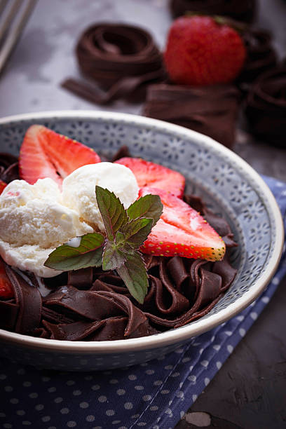 istock Chocolate pasta with ice cream and strawberry 540597568