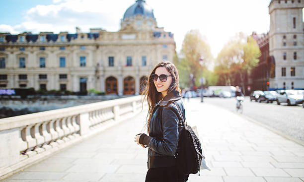 istock Young Parisian woman walking 540598982