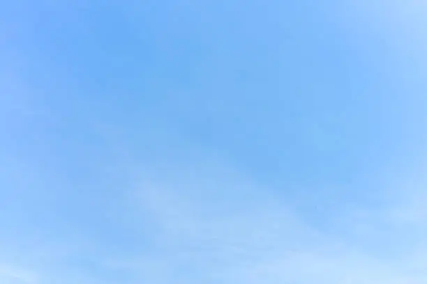 Beautiful clouds in the clear blue sky background